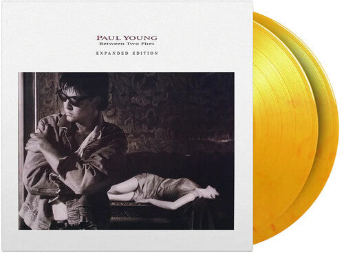 Paul Young: Between Two Fires - Limited & Expanded 180-Gram Flame Colored Vinyl / RECORD